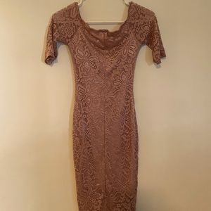 Above the knees length dress.